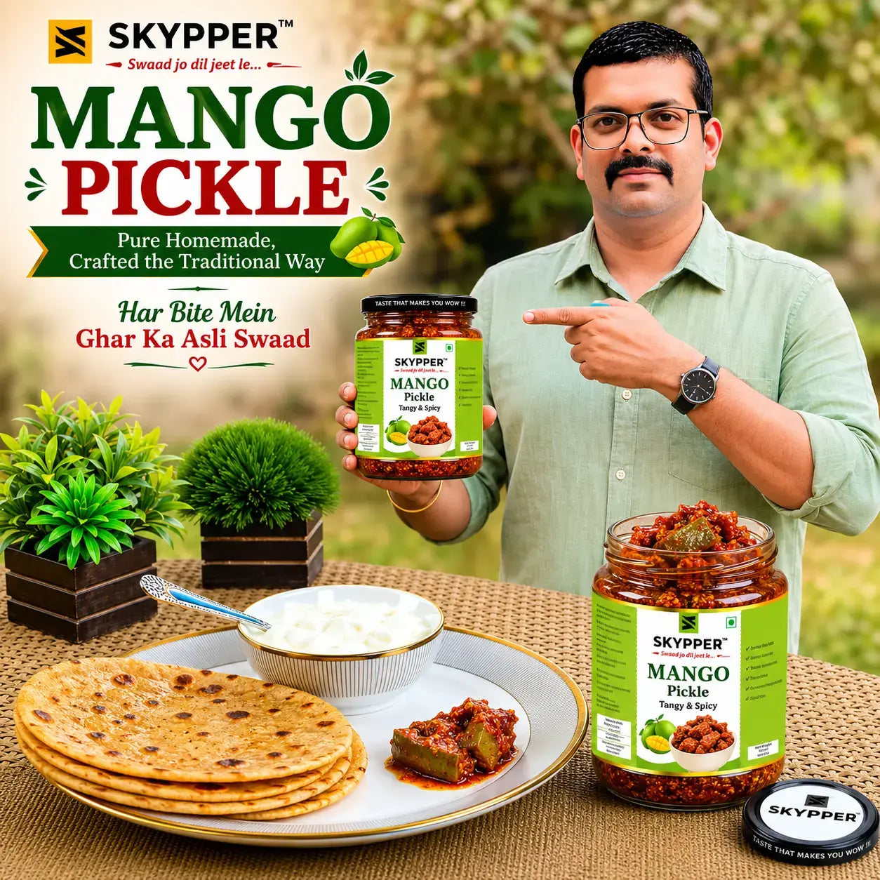 Man pointing at a jar of Skyppper Mango Pickle with food items on a table
